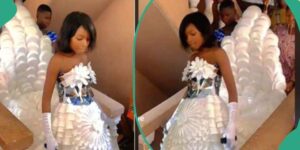 Read more about the article Woman Makes Wedding Dress From Plastic Cups, Spoons & Plates, Netizens Wowed Over Unique Design